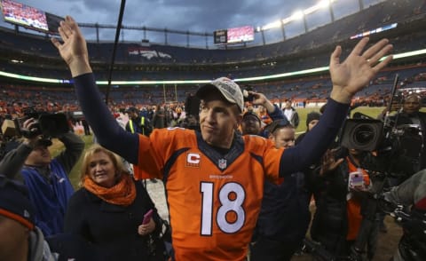 Jan 24, 2016; Denver, CO, USA; Denver Broncos quarterback Peyton Manning (18) waves to fans after the AFC Championship football game at Sports Authority Field at Mile High.Denver Broncos defeated New England Patriots 20-18 to earn a trip to Super Bowl 50. Mandatory Credit: Chris Humphreys-USA TODAY Sports