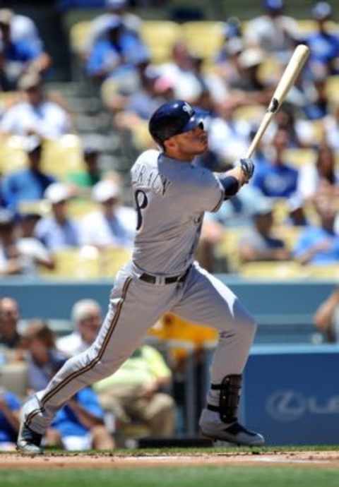 July 12, 2015; Los Angeles, CA, USA; Milwaukee Brewers right fielder Ryan Braun (8) hits a solo home run in the first inning against the Los Angeles Dodgers at Dodger Stadium. Mandatory Credit: Gary A. Vasquez-USA TODAY Sports