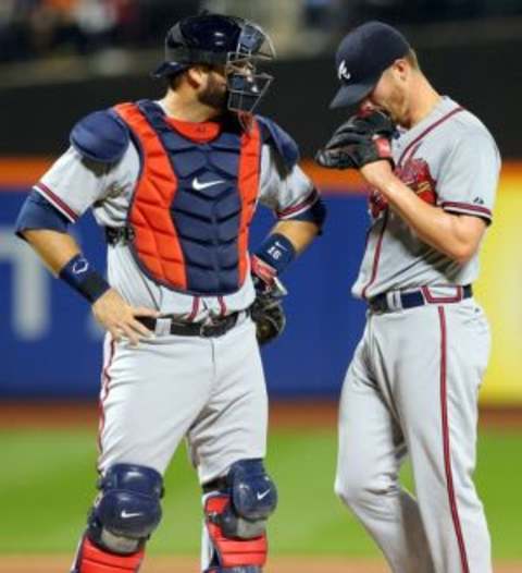 Sep 21, 2015; New York City, NY, USA; Atlanta Braves catcher A.J. Pierzynski (15) talks with starting pitcher Shelby Miller (17) on the mound during the second inning against the New York Mets at Citi Field. Mandatory Credit: Brad Penner-USA TODAY Sports