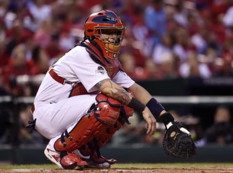 Oct 9, 2015; St. Louis, MO, USA; St. Louis Cardinals catcher Yadier Molina behind the plate in the first inning against the Chicago Cubs in game one of the NLDS at Busch Stadium. Mandatory Credit: Scott Rovak-USA TODAY Sports