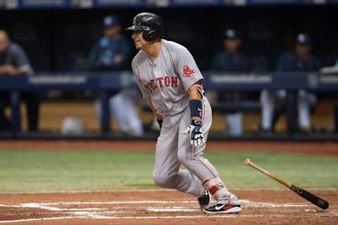 Sep 13, 2015; St. Petersburg, FL, USA; Boston Red Sox designated hitter Allen Crai (5) hits a single against the Tampa Bay Rays at Tropicana Field. Mandatory Credit: Jeff Griffith-USA TODAY Sports