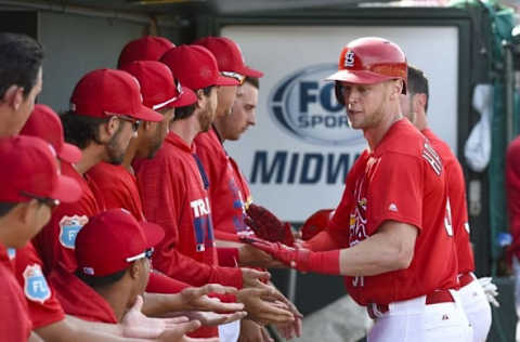 Mar 21, 2016; Jupiter, FL, USA; St. Louis Cardinals left fielder Jeremy Hazelbaker (91) is congratulated after hitting a two run home run against the Boston Red Sox during the game at Roger Dean Stadium. The Red Sox defeated the Cardinals 4-3. Mandatory Credit: Scott Rovak-USA TODAY Sports