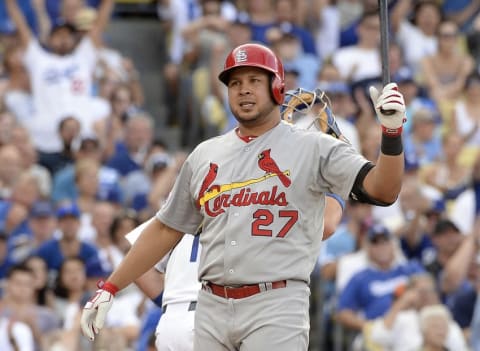 Oct 3, 2014; Los Angeles, CA, USA; St. Louis Cardinals shortstop Jhonny Peralta (27) reacts after striking out in the fourth inning against the Los Angeles Dodgers in game one of the 2014 NLDS playoff baseball game at Dodger Stadium. Mandatory Credit: Richard Mackson-USA TODAY Sports