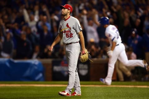 Oct 12, 2015; Chicago, IL, USA; St. Louis Cardinals starting pitcher Michael Wacha (52) reacts after giving up a home run to Chicago Cubs third baseman Kris Bryant (17) during the fifth inning in game three of the NLDS at Wrigley Field. Mandatory Credit: Jerry Lai-USA TODAY Sports