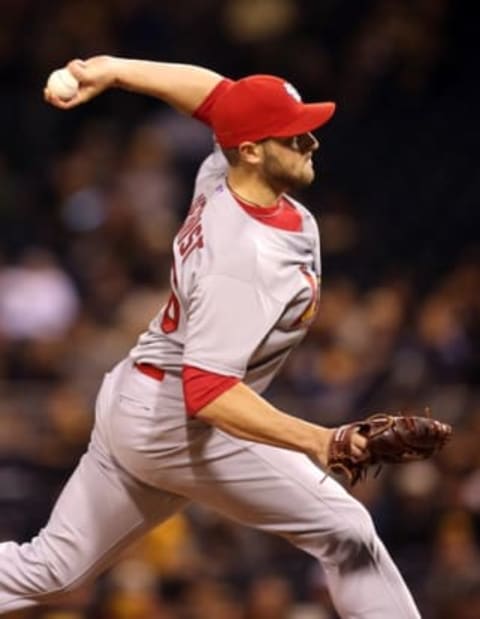 Sep 30, 2015; Pittsburgh, PA, USA; St. Louis Cardinals relief pitcher Kevin Siegrist (46) pitches against the Pittsburgh Pirates during the eighth inning at PNC Park. The Cardinals won 11-1. Mandatory Credit: Charles LeClaire-USA TODAY Sports