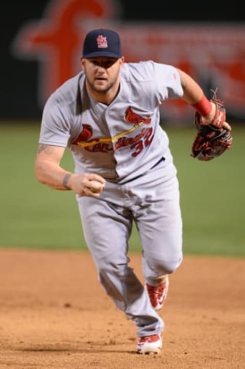 Apr 28, 2016; Phoenix, AZ, USA; St. Louis Cardinals first baseman Matt Adams (32) runs to the bag after fielding a ground ball against the Arizona Diamondbacks during the third inning at Chase Field. Mandatory Credit: Joe Camporeale-USA TODAY Sports