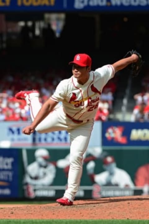 Apr 16, 2016; St. Louis, MO, USA; St. Louis Cardinals relief pitcher Seung Hwan Oh (26) pitches to a Cincinnati Reds batter during the seventh inning at Busch Stadium. Mandatory Credit: Jeff Curry-USA TODAY Sports