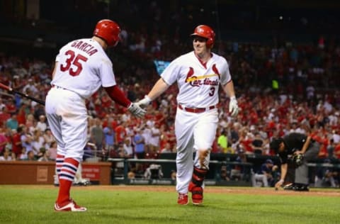 Jul 18, 2016; St. Louis, MO, USA; St. Louis Cardinals second baseman Jedd Gyorko (3) is congratulated by third baseman Greg Garcia (35) after hitting a solo home run off of San Diego Padres relief pitcher Jose Dominguez (not pictured) during the seventh inning at Busch Stadium. The Cardinals won 10-2. Mandatory Credit: Jeff Curry-USA TODAY Sports