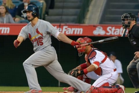 May 11, 2016; Anaheim, CA, USA; St. Louis Cardinals center fielder Randal Grichuk (15) hits an RBI single in the second inning of the game against the Los Angeles Angels at Angel Stadium of Anaheim. Mandatory Credit: Jayne Kamin-Oncea-USA TODAY Sports