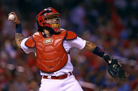 Jun 29, 2016; St. Louis, MO, USA; St. Louis Cardinals catcher Yadier Molina (4) in action against the Kansas City Royals at Busch Stadium. Mandatory Credit: Billy Hurst-USA TODAY Sports