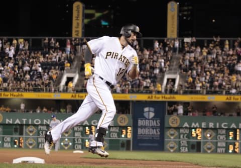 Jun 24, 2016; Pittsburgh, PA, USA; Pittsburgh Pirates right fielder Matt Joyce (17) circles the bases after hitting a solo home run against the Los Angeles Dodgers during the seventh inning at PNC Park. Mandatory Credit: Charles LeClaire-USA TODAY Sports