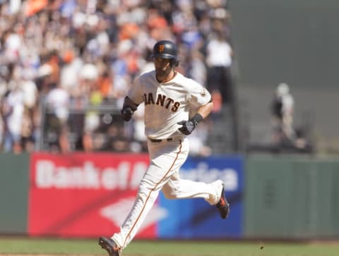 Oct 1, 2016; San Francisco, CA, USA; San Francisco Giants left fielder Angel Pagan (16) trots around the bases after hitting a home run against the Los Angeles Dodgers during the fifth inning at AT&T Park. Mandatory Credit: Neville E. Guard-USA TODAY Sports