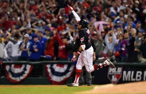 Nov 2, 2016; Cleveland, OH, USA; Cleveland Indians center fielder Rajai Davis (20) celebrates after hitting a two-run home run against the Chicago Cubs in the 8th inning in game seven of the 2016 World Series at Progressive Field. Mandatory Credit: Ken Blaze-USA TODAY Sports