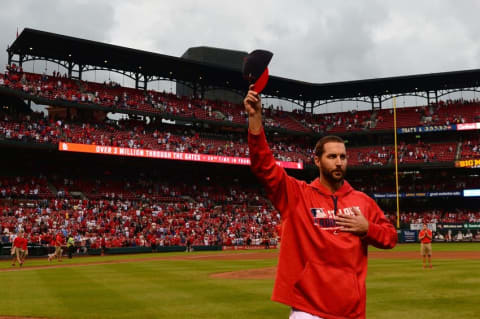 Oct 2, 2016; St. Louis, MO, USA; St. Louis Cardinals starting pitcher Adam Wainwright (50) salutes the fans after the final game of the season against the Pittsburgh Pirates at Busch Stadium. The Cardinals won 10-4. Mandatory Credit: Jeff Curry-USA TODAY Sports