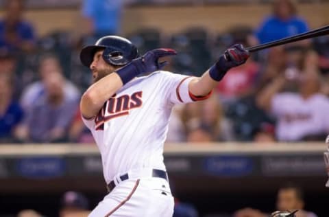 Sep 6, 2016; Minneapolis, MN, USA; Minnesota Twins first baseman Trevor Plouffe (24) hits a home run in the first inning against the Kansas City Royals at Target Field. Mandatory Credit: Brad Rempel-USA TODAY Sports