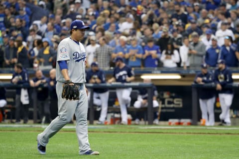 MILWAUKEE, WI – OCTOBER 13: Hyun-Jin Ryu #99 of the Los Angeles Dodgers walks back to the dugout after being pulled during the fifth inning against the Milwaukee Brewers in Game Two of the National League Championship Series at Miller Park on October 13, 2018 in Milwaukee, Wisconsin. (Photo by Rob Carr/Getty Images)