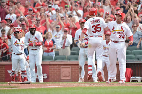 ST. LOUIS, MO – Aug 11: St. Louis Cardinals Outfield Lane Thomas (35) comes in to score after hitting a grand slam in the bottom of the seventh inning putting the Cardinals ahead 9-8 during a regular season game featuring the Pittsburgh Pirates at the St. Louis Cardinals on August 11, 2019 at Busch Stadium in St. Louis, MO. (Photo by Rick Ulreich/Icon Sportswire via Getty Images)