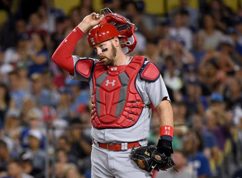 LOS ANGELES, CALIFORNIA – AUGUST 05: Matt Wieters #32 of the St. Louis Cardinals reacts to a Justin Turner #10 of the Los Angeles Dodgers double to score Max Muncy #13, to take a 6-0 dodger lead, during the fourth inning at Dodger Stadium on August 05, 2019 in Los Angeles, California. (Photo by Harry How/Getty Images)