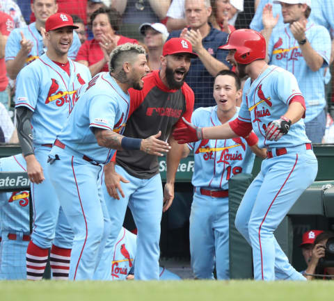 St. Louis Cardinals catcher Yadier Molina (4), center left, and shortstop Paul DeJong (12), right, celebrate after hitting back-to-back home runs off Chicago Cubs relief pitcher Craig Kimbrel (24) in the ninth inning at Wrigley Field Saturday, Sept. 21, 2019, in Chicago.(John J. Kim/Chicago Tribune/Tribune News Service via Getty Images)