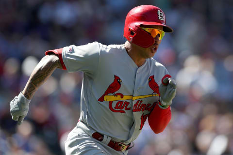 DENVER, COLORADO – SEPTEMBER 12: Kolten Wong #16 of the St Louis Cardinals runs down the baseline after hitting a double in the fourth inning against the Colorado Rockies at Coors Field on September 12, 2019 in Denver, Colorado. (Photo by Matthew Stockman/Getty Images)