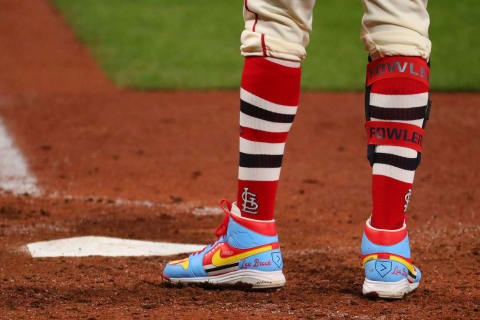 Dexter Fowler #25 of the St. Louis Cardinals wears shoes that pay tribute to former Cardinals player Lou Brock during the game against the Milwaukee Brewers at Busch Stadium on September 26, 2020 in St Louis, Missouri. Brock, one of the most revered players in Cardinals history, passed away on September 6, 2020 at the age of 81. (Photo by Dilip Vishwanat/Getty Images)