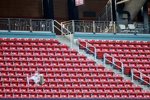 ST. LOUIS, MO – JULY 24: St. Louis Cardinals president of baseball operations John Mozeliak watches the Opening Day game between the St. Louis Cardinals and the Pittsburgh Pirates from the upper seats at Busch Stadium on July 24, 2020 in St. Louis, Missouri. The 2020 season had been postponed since March due to the COVID-19 pandemic. (Photo by Scott Kane/Getty Images)