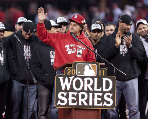 ST. LOUIS, MO – OCTOBER 30: Manager Tony LaRussa of the St. Louis Cardinals acknowledges the celebrating crowd inside Busch Stadium on October 30, 2011 in St Louis, Missouri. (Photo by Ed Szczepanski/Getty Images)