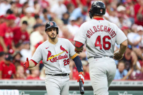 CINCINNATI, OH – JULY 22: Nolan Arenado #28 of the St. Louis Cardinals puts his hand out to high five Paul Goldschmidt #46 of the St. Louis Cardinals after Goldschmidt hit a home run in the top of the fifth inning at Great American Ball Park on July 22, 2022 in Cincinnati, Ohio. (Photo by Lauren Bacho/Getty Images)