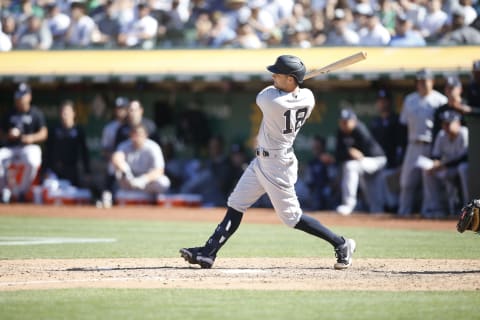 Andrew Benintendi #18 of the New York Yankees bats during the game against the Oakland Athletics.(Photo by Michael Zagaris/Oakland Athletics/Getty Images)