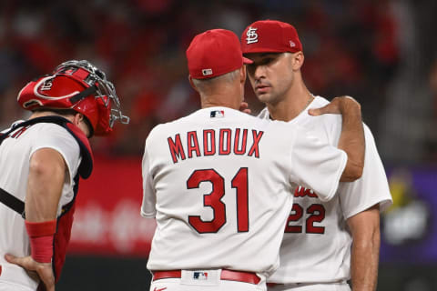 Pitching Coach Mike Maddux #31 of the St. Louis Cardinals speaks with Jack Flaherty #22 of the St. Louis Cardinals at Busch Stadium. (Photo by Joe Puetz/Getty Images)