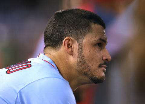 Nolan Arenado #28 of the St. Louis Cardinals looks on from the dugout during the eighth inning against the Los Angeles Dodgers (Photo by Harry How/Getty Images)