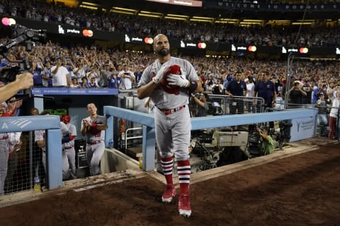 LOS ANGELES, CALIFORNIA – SEPTEMBER 23: Albert Pujols #5 of the St. Louis Cardinals acknowledges the crowd after hitting his 700th career home run at Dodger Stadium on September 23, 2022 in Los Angeles, California. (Photo by Ashley Landis – Pool/Getty Images)