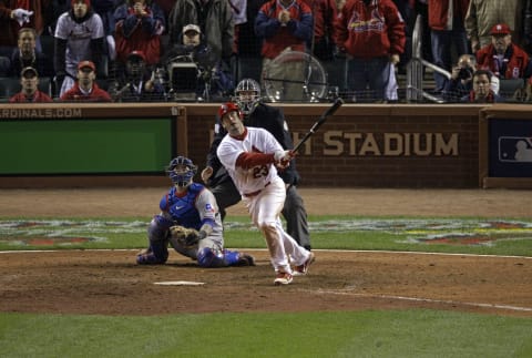 ST LOUIS, MO – OCTOBER 27: David Freese #23 of the St. Louis Cardinals hits a walk off solo home run in the 11th inning to win Game Six of the MLB World Series against the Texas Rangers at Busch Stadium on October 27, 2011 in St Louis, Missouri. The Cardinals won 10-9. (Photo by Rob Carr/Getty Images)