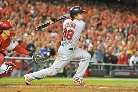 WASHINGTON, DC – OCTOBER 12: Pete Kozma #38 of the St. Louis Cardinals hits a two run single in the ninth inning during Game Five of the National League Division Series against the Washington Nationals at Nationals Park on October 12, 2012 in Washington, DC. The Cardinals won 9-6. (Photo by Mitchell Layton/Getty Images)