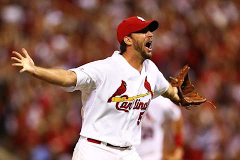 ST LOUIS, MO – OCTOBER 09: Adam Wainwright #50 of the St. Louis Cardinals celebrates defeating the Pittsburgh Pirates 6 to 1 in Game Five of the National League Division Series at Busch Stadium on October 9, 2013 in St Louis, Missouri. (Photo by Elsa/Getty Images)