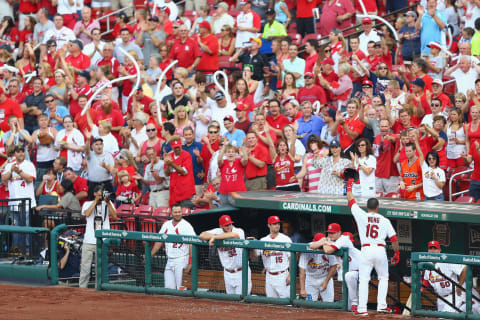 ST. LOUIS, MO – JUNE 3: Kolten Wong #16 of the St. Louis Cardinals acknowledges the crowd after hitting a grand slam against the Kansas City Royals in the second inning at Busch Stadium on June 3, 2014 in St. Louis, Missouri. The Royals beat the Cards 8-7. (Photo by Dilip Vishwanat/Getty Images)