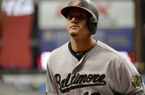 ST PETERSBURG, FL – MAY 27: Manny Machado #13 of the Baltimore Orioles exits the field after scoring in the first inning against the Baltimore Orioles on May 27, 2018 at Tropicana Field in St Petersburg, Florida. (Photo by Julio Aguilar/Getty Images)