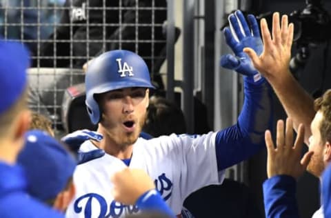 LOS ANGELES, CA – JUNE 27: Cody Bellinger #35 of the Los Angeles Dodgers celebrates in the dugout after hitting a solo home run in the eighth inning of the game against the Chicago Cubs at Dodger Stadium on June 27, 2018 in Los Angeles, California. (Photo by Jayne Kamin-Oncea/Getty Images)