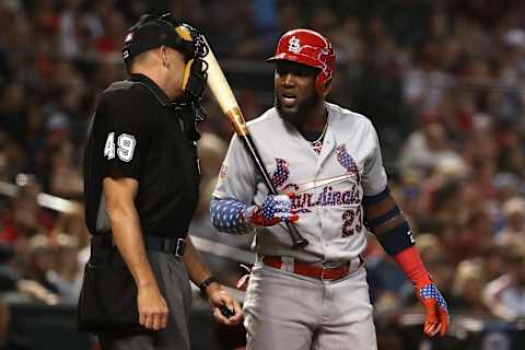 PHOENIX, AZ – JULY 02: Marcell Ozuna #23 of the St. Louis Cardinals reacts to home plate umpire Andy Fletcher after a called third strike during the first inning of the MLB game against the Arizona Diamondbacks at Chase Field on July 2, 2018 in Phoenix, Arizona. (Photo by Christian Petersen/Getty Images)