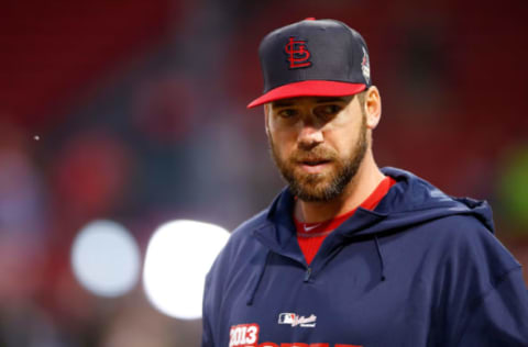 BOSTON, MA – OCTOBER 23: Chris Carpenter of the St. Louis Cardinals looks on during batting practice before Game One of the World Series against the Boston Red Sox at Fenway Park on October 23, 2013 in Boston, Massachusetts. (Photo by Jared Wickerham/Getty Images)