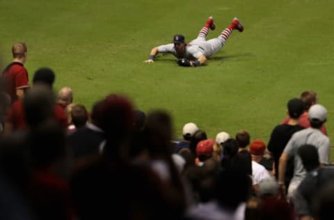 PHOENIX, AZ – JUNE 27: Outfielder Randal Grichuk #15 of the St. Louis Cardinals makes a diving catch against the Arizona Diamondbacks during the ninth inning of the MLB game at Chase Field on June 27, 2017 in Phoenix, Arizona. The Diamondbacks defeated the Cardinals 6-5 in 10 innings. (Photo by Christian Petersen/Getty Images)