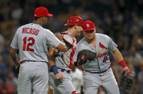 PITTSBURGH, PA – SEPTEMBER 22: Carson Kelly #30 of the St. Louis Cardinals celebrates with Juan Nicasio #12 and Luke Voit #40 after defeating the Pittsburgh Pirates at PNC Park on September 22, 2017 in Pittsburgh, Pennsylvania. (Photo by Justin K. Aller/Getty Images)