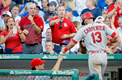 CHICAGO, IL – SEPTEMBER 16: Matt Carpenter #13 of the St. Louis Cardinals is congratulated by manager Mike Matheny #22 after hitting a home run against the Chicago Cubs during the eighth inning at Wrigley Field on September 16, 2017 in Chicago, Illinois. (Photo by Jon Durr/Getty Images)