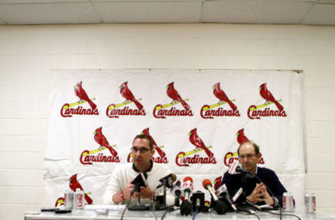 JUPITER, FL – FEBRUARY 16: General Manager John Mozeliak (L) and owner William DeWitt, Jr. of the St. Louis Cardinals speak at a press conference at Roger Dean Stadium on February 16, 2011 in Jupiter, Florida. (Photo by Marc Serota/Getty Images)