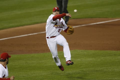 Scott Rolen of the Cardinals throws to make an out during game 3 of the NLCS between the New York Mets and St. Louis Cardinals at Busch Stadium in St. Louis, Missouri on October 14, 2006. St. Louis won 5-0 to take a 2 games to 1 lead in the series. (Photo by G. N. Lowrance/Getty Images)