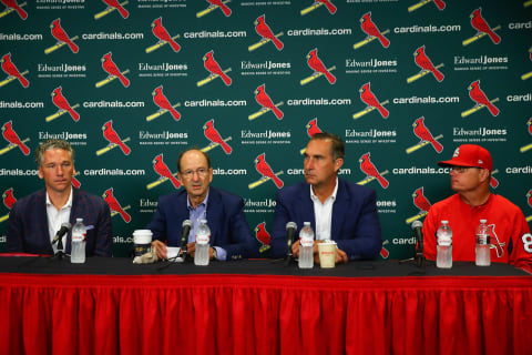 ST. LOUIS, MO – JULY 15: (L to R) Mike Girsch, general manager of the St. Louis Cardinals; Bill DeWitt Jr., managing partner and chairman of the St. Louis Cardinals; John Mozeliak, President of Baseball Operations of the St. Louis Cardinals and Mike Schildt, interim manager of the St. Louis Cardinals addressing a change in the manager during a press conference prior to a game between the St. Louis Cardinals and the Cincinnati Reds at Busch Stadium on July 15, 2018 in St. Louis, Missouri. (Photo by Dilip Vishwanat/Getty Images)