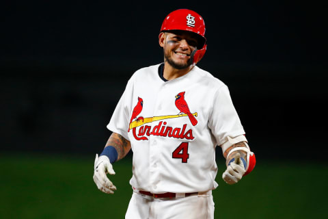 ST. LOUIS, MO – APRIL 22: Yadier Molina #4 of the St. Louis Cardinals acknowledges teammates in the dugout after hitting an RBI single against the Milwaukee Brewers in the seventh inning at Busch Stadium on April 22, 2019 in St. Louis, Missouri. (Photo by Dilip Vishwanat/Getty Images)