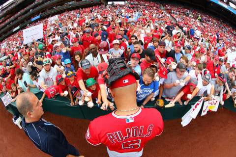 Albert Pujols #5 of the Los Angeles Angels of Anaheim signs autographs for fans prior to playing against the St. Louis Cardinals at Busch Stadium on June 23, 2019 in St. Louis, Missouri. (Photo by Dilip Vishwanat/Getty Images)