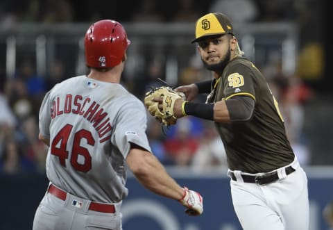 SAN DIEGO, CA – JUNE 28: Fernando Tatis Jr. #23 of the San Diego Padres throws passed Paul Goldschmidt #46 of the St. Louis Cardinals as he tries to turn a double play during the third inning of a baseball game at Petco Park June 28, 2019 in San Diego, California. (Photo by Denis Poroy/Getty Images)