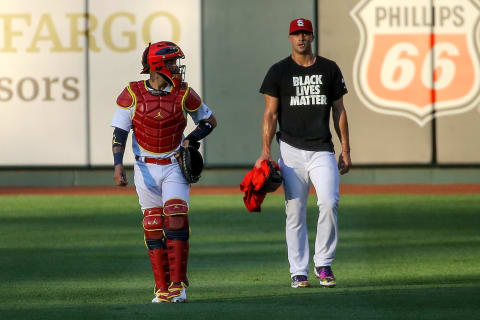 ST. LOUIS, MO – JULY 24: Yadier Molina #4 and Jack Flaherty #22 of the St. Louis Cardinals walk toward the dugout prior to the Opening Day game against the Pittsburgh Pirates at Busch Stadium on July 24, 2020 in St. Louis, Missouri. The 2020 season had been postponed since March due to the COVID-19 pandemic. (Photo by Scott Kane/Getty Images)The Cardinals let Jack Flaherty test free agency